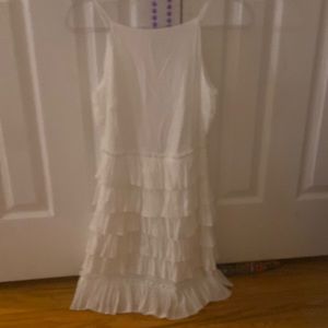 Brooklyn’s white ruffle mini dress